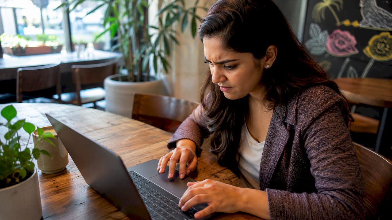 Frustrated businesswoman facing slow website